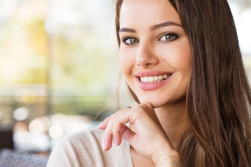 attractive woman shows off her healthy smile